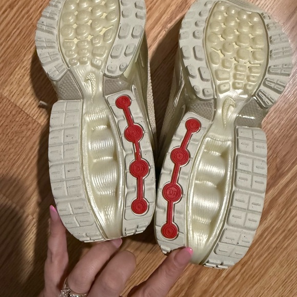 Nike Women's Metallic Gold Athletic Shoes - Picture 2 of 3